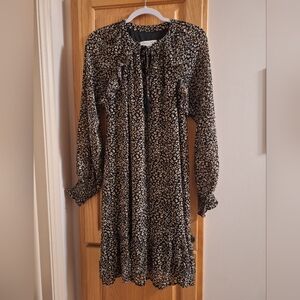 Knee Length Woman"s V Neck Dress  With Tie & Ruffles. Easy For Traveling Too.